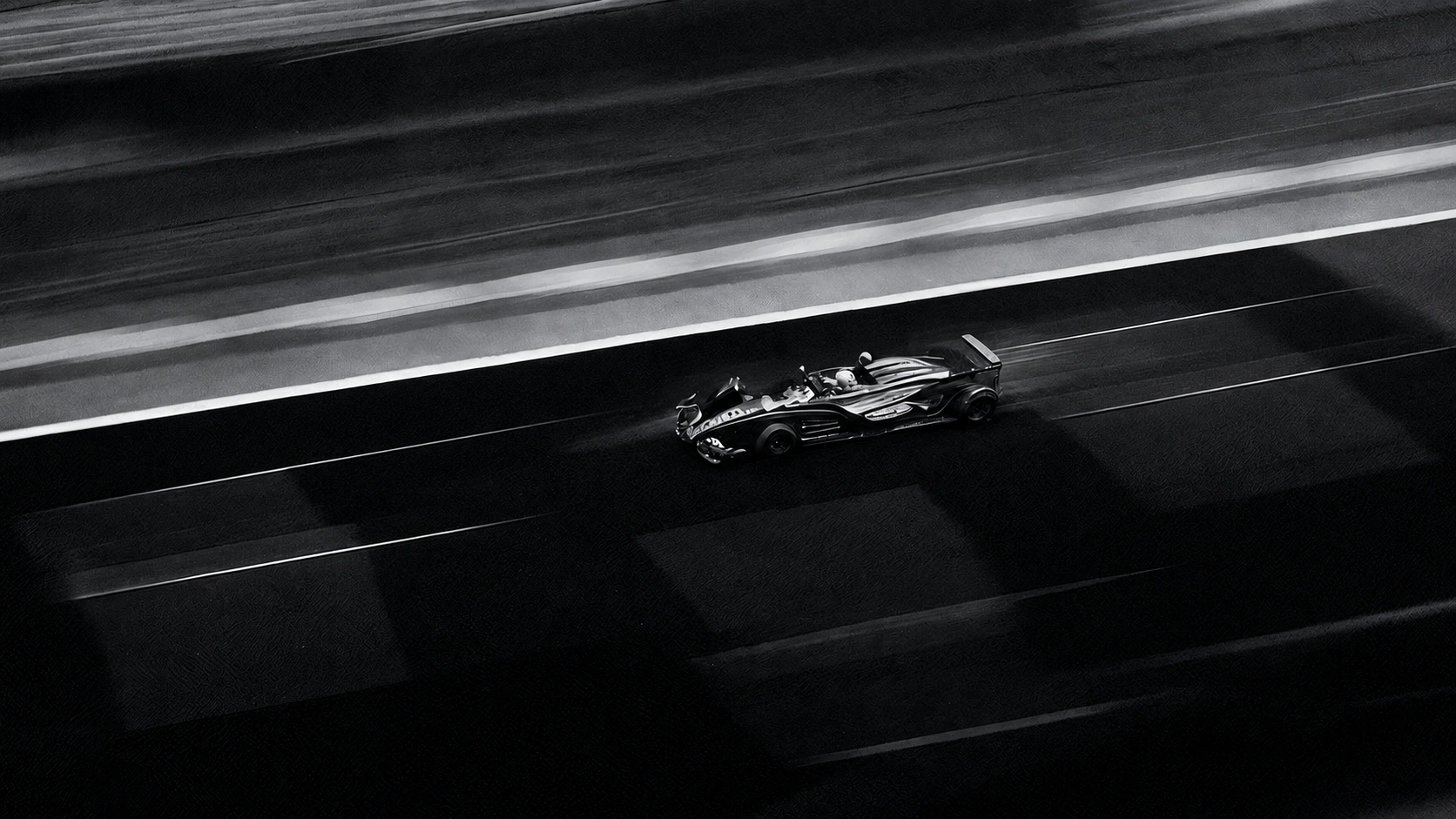 Carro de corrida em uma pista em preto e branco.
